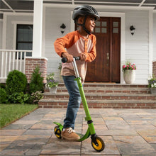 Load image into Gallery viewer, Boy on scooter with helmet