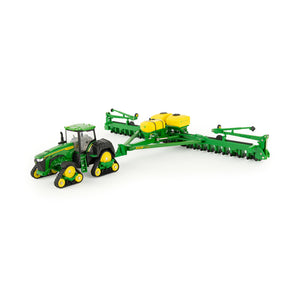 Track tractor with planter attached