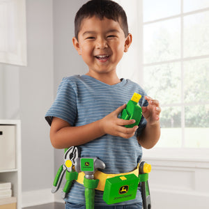 Boy playing with tape measure