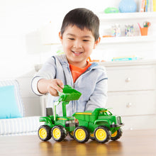 Load image into Gallery viewer, Boy playing with truck and tractor
