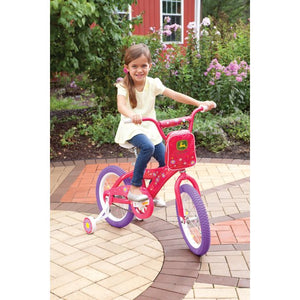Girl riding pink and purple bike