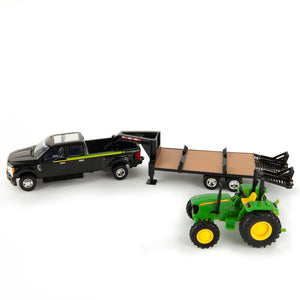 Black truck with trailer and tractor