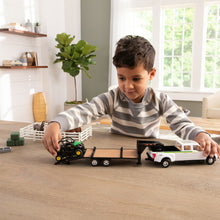 Load image into Gallery viewer, Boy playing with truck and trailer
