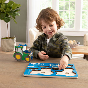 Boy playing with puzzle