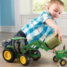 Load image into Gallery viewer, Boy playing with tractor and haybale
