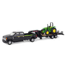 Load image into Gallery viewer, Black truck with trailer and tractor
