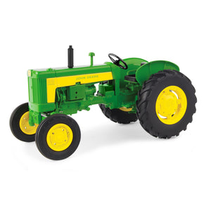 Metal toy tractor with plastic wheels
